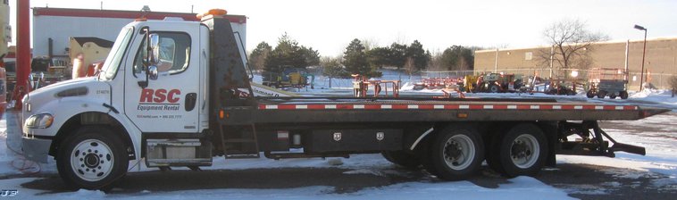 image for item 7693 2006 Freightliner M2 106 roll back truck