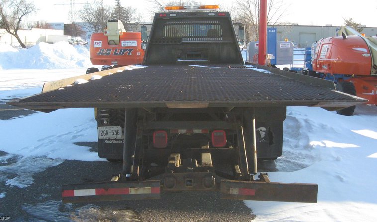 image for item 7693 2006 Freightliner M2 106 roll back truck