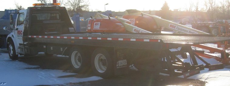 image for item 7693 2006 Freightliner M2 106 roll back truck