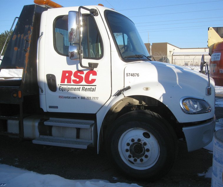 image for item 7693 2006 Freightliner M2 106 roll back truck