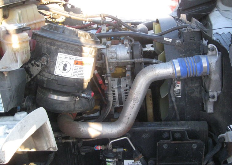 image for item 7693 2006 Freightliner M2 106 roll back truck