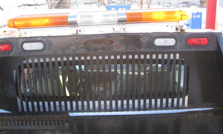 image for item 7693 2006 Freightliner M2 106 roll back truck
