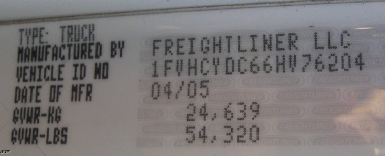 image for item 7693 2006 Freightliner M2 106 roll back truck