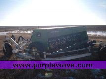 image for item 2300 (2) John Deere 8300 disc drills with two drill hitch