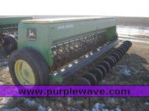 image for item 2300 (2) John Deere 8300 disc drills with two drill hitch