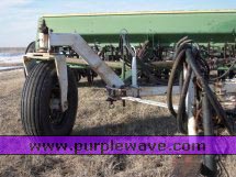 image for item 2300 (2) John Deere 8300 disc drills with two drill hitch