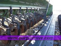 image for item 2300 (2) John Deere 8300 disc drills with two drill hitch