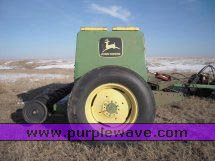 image for item 2300 (2) John Deere 8300 disc drills with two drill hitch