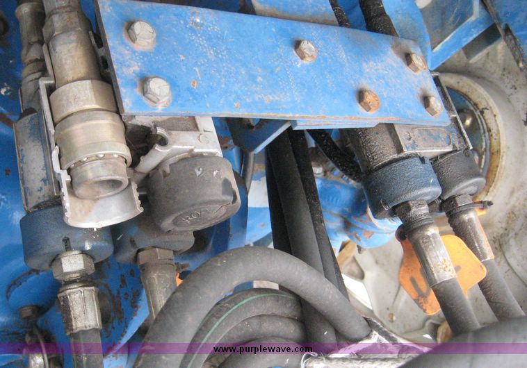 image for item 3876 Ford 7700 tractor with Westenodrf loader