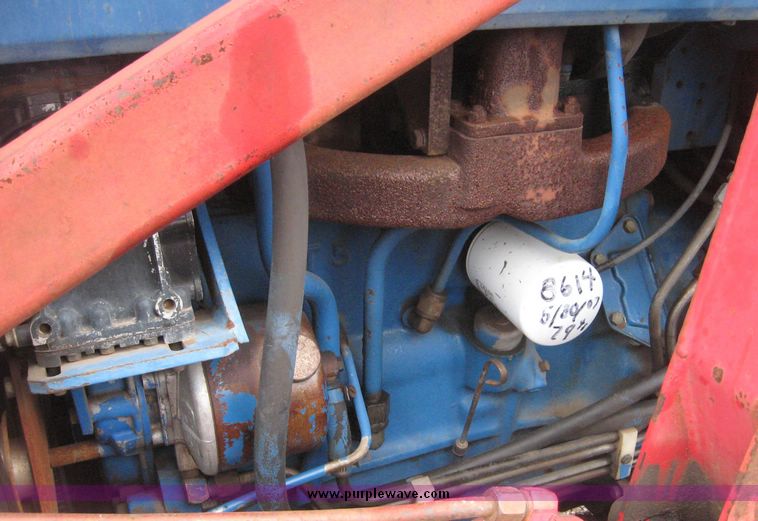 image for item 3876 Ford 7700 tractor with Westenodrf loader