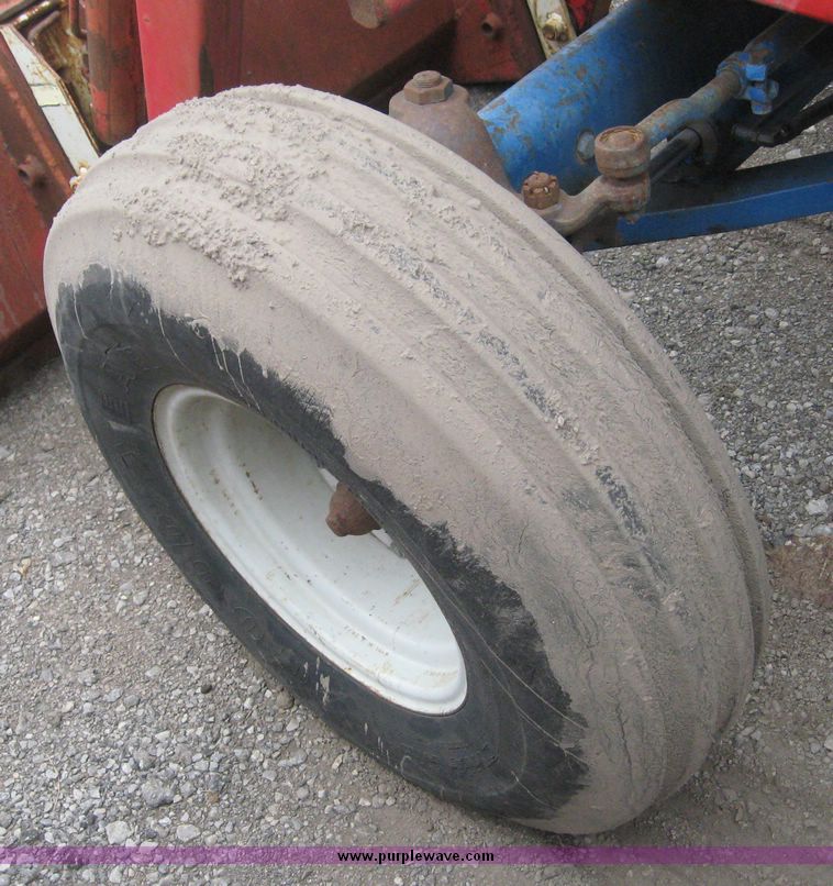 image for item 3876 Ford 7700 tractor with Westenodrf loader