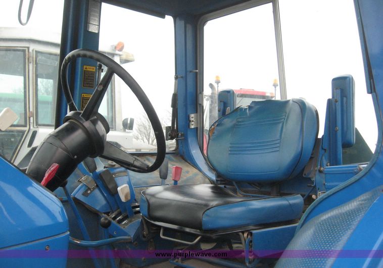 image for item 3876 Ford 7700 tractor with Westenodrf loader