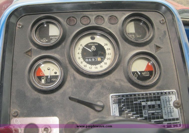 image for item 3876 Ford 7700 tractor with Westenodrf loader