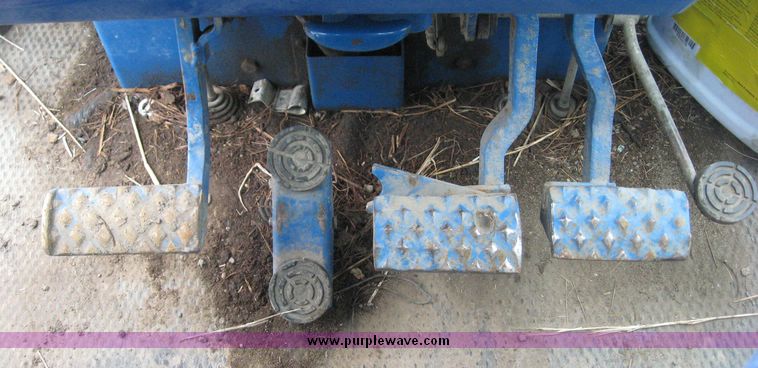 image for item 3876 Ford 7700 tractor with Westenodrf loader