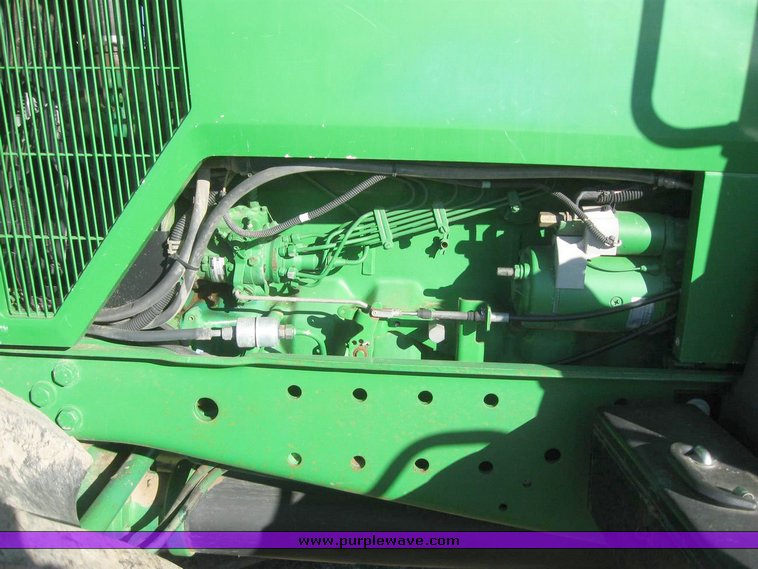 image for item 6832 1993 John Deere 7600 MFWD tractor