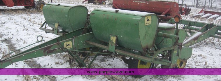 image for item 7777 John Deere 1240 four row planter