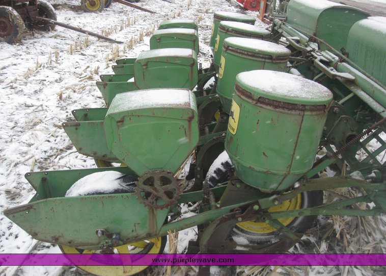 image for item 7777 John Deere 1240 four row planter