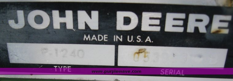 image for item 7777 John Deere 1240 four row planter