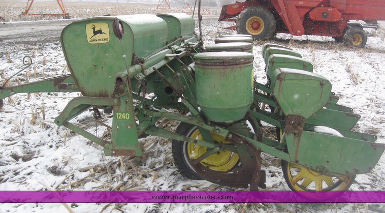 image for item 7777 John Deere 1240 four row planter