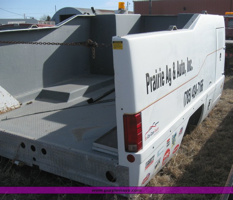 image for item 8083 Fiberglass tire service bed