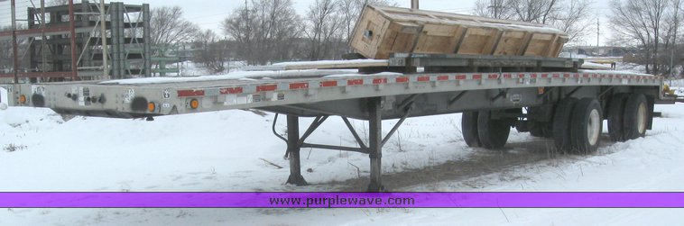 image for item 7810 1997 Wilson CF-900 48' spread axle flat bed trailer