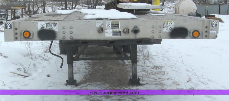 image for item 7810 1997 Wilson CF-900 48' spread axle flat bed trailer