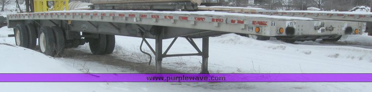 image for item 7810 1997 Wilson CF-900 48' spread axle flat bed trailer