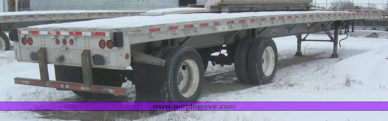 image for item 7810 1997 Wilson CF-900 48' spread axle flat bed trailer