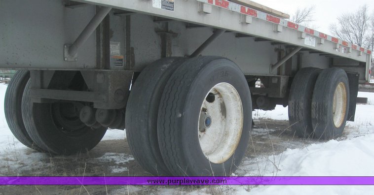 image for item 7810 1997 Wilson CF-900 48' spread axle flat bed trailer