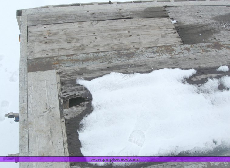 image for item 7810 1997 Wilson CF-900 48' spread axle flat bed trailer