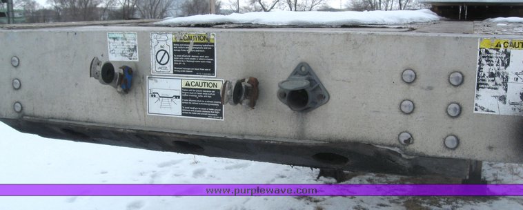 image for item 7810 1997 Wilson CF-900 48' spread axle flat bed trailer