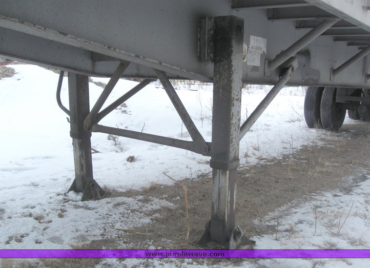 image for item 7810 1997 Wilson CF-900 48' spread axle flat bed trailer