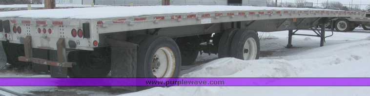 image for item 7811 1995 Wilson CF-900 48' spread axle flat bed trailer