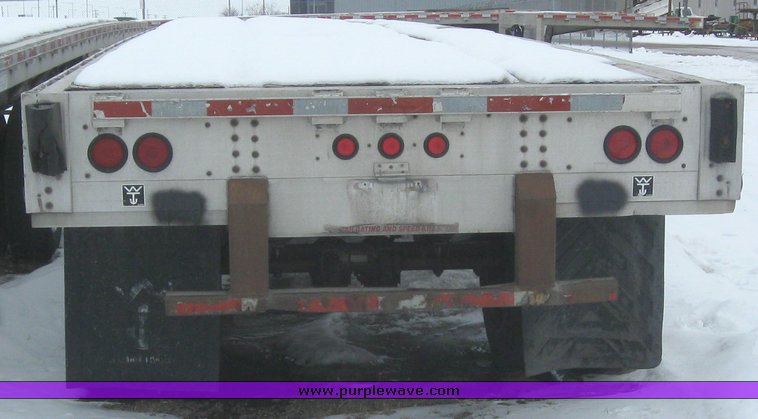 image for item 7811 1995 Wilson CF-900 48' spread axle flat bed trailer