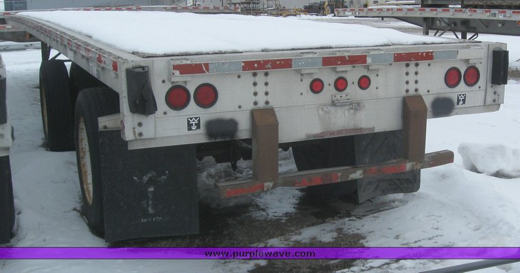 image for item 7811 1995 Wilson CF-900 48' spread axle flat bed trailer