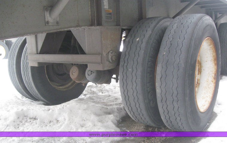 image for item 7811 1995 Wilson CF-900 48' spread axle flat bed trailer
