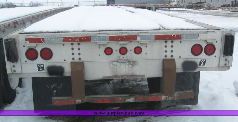 image for item 7811 1995 Wilson CF-900 48' spread axle flat bed trailer