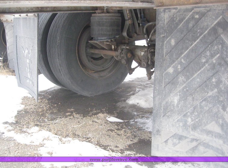 image for item 7811 1995 Wilson CF-900 48' spread axle flat bed trailer