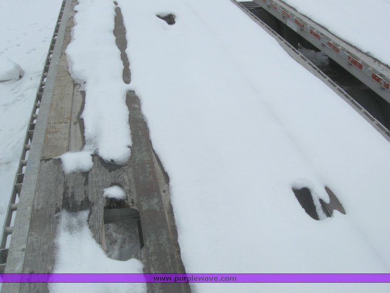 image for item 7811 1995 Wilson CF-900 48' spread axle flat bed trailer