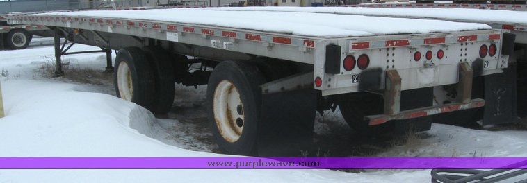 image for item 7812 1995 Wilson CF-900 48' spread axle flat bed trailer