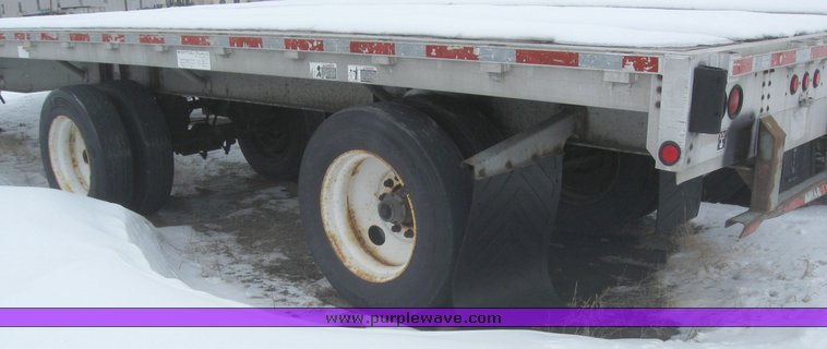 image for item 7812 1995 Wilson CF-900 48' spread axle flat bed trailer