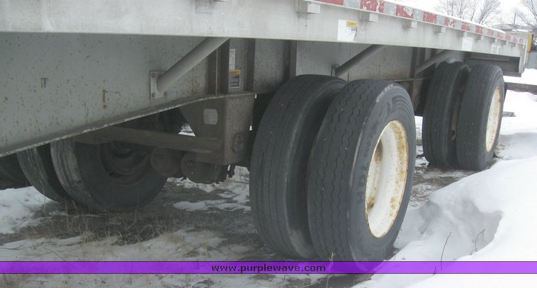 image for item 7812 1995 Wilson CF-900 48' spread axle flat bed trailer
