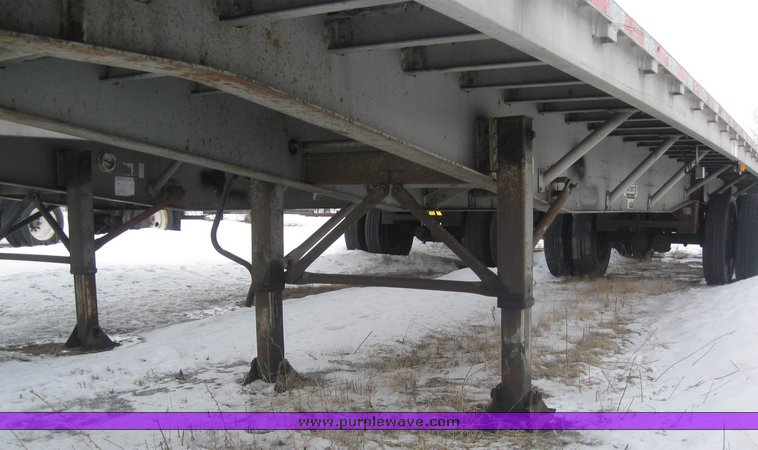 image for item 7812 1995 Wilson CF-900 48' spread axle flat bed trailer