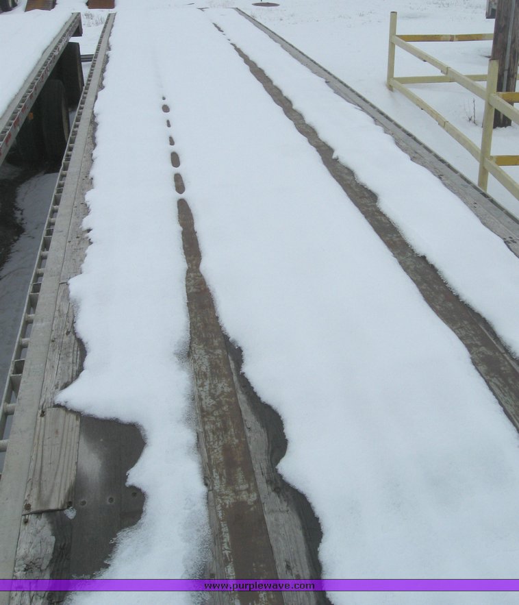 image for item 7812 1995 Wilson CF-900 48' spread axle flat bed trailer