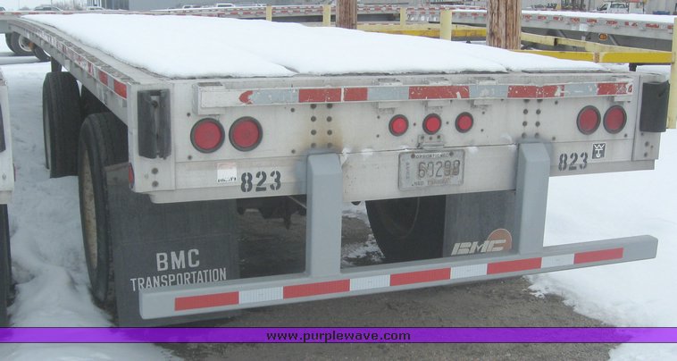 image for item 7813 1995 Wilson 48' spread axle flat bed trailer