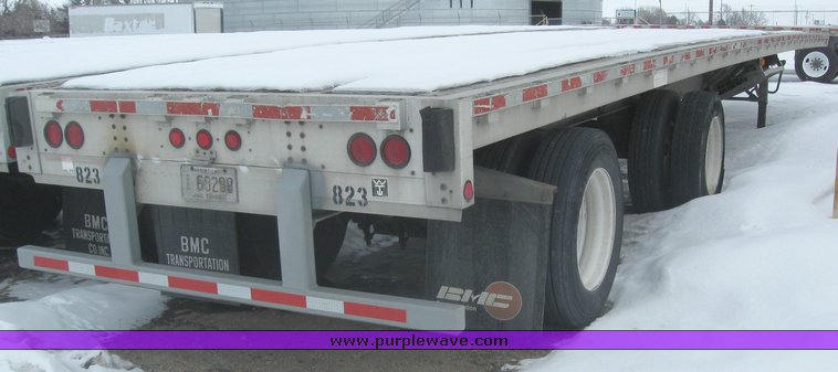 image for item 7813 1995 Wilson 48' spread axle flat bed trailer