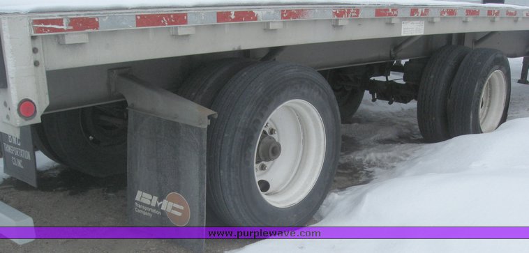image for item 7813 1995 Wilson 48' spread axle flat bed trailer