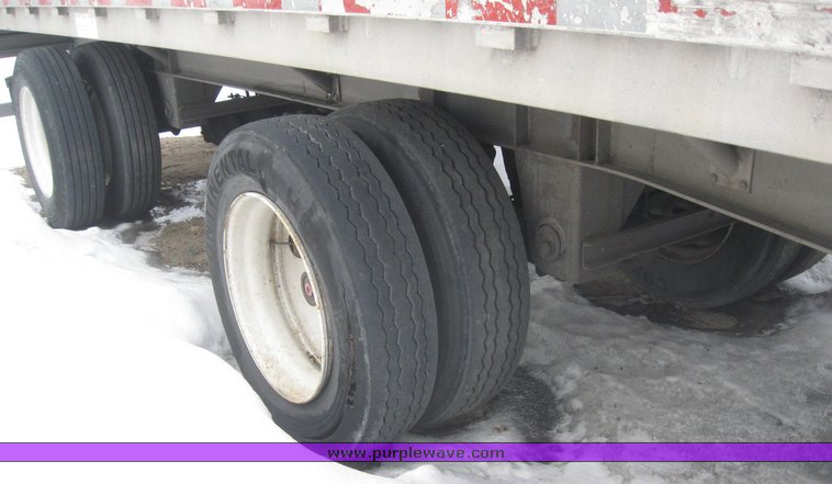 image for item 7813 1995 Wilson 48' spread axle flat bed trailer