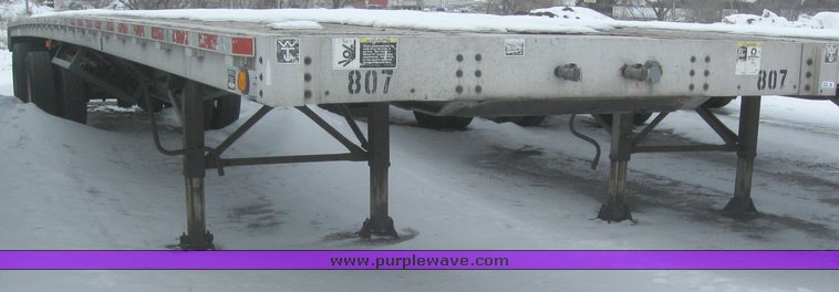 image for item 7814 Wilson 48' spread axle flat bed trailer