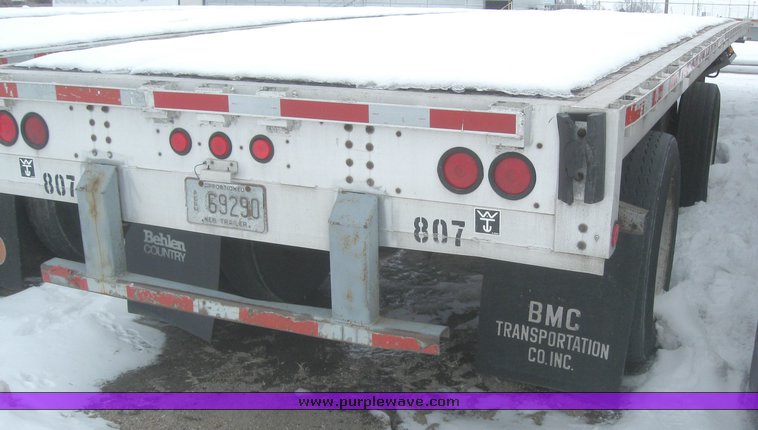 image for item 7814 Wilson 48' spread axle flat bed trailer